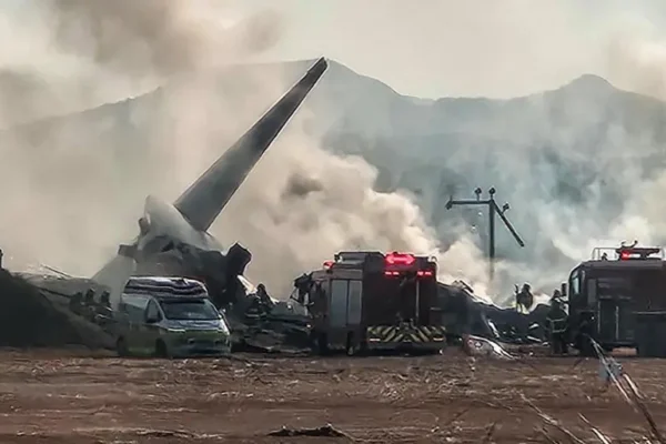 Firefighters carry out extinguishing operations on an aircraft which drove off runaway at Muan International Airport in Muan, South Jeolla Province, South Korea, December 29, 2024