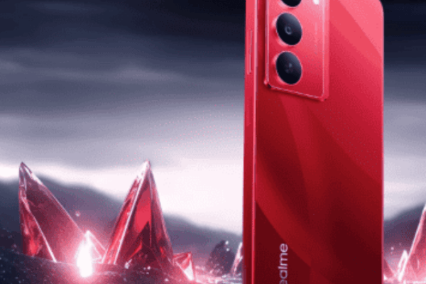 A red color realme phone standing in fornt